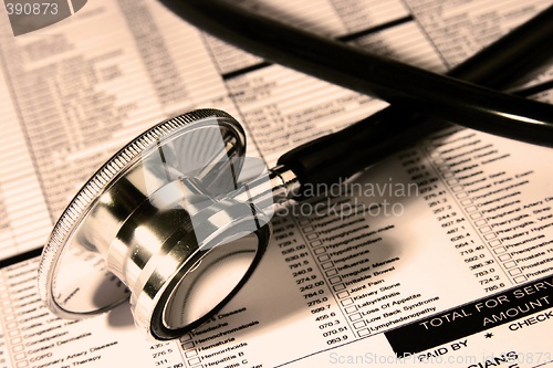 Image of Stethoscope Over A Report