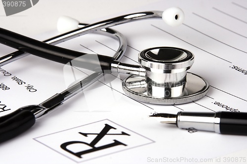 Image of Stethoscope Over A Report