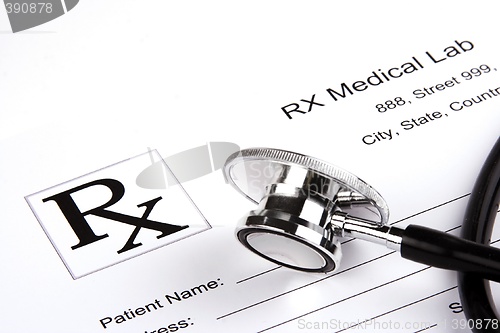 Image of Stethoscope Over A Report