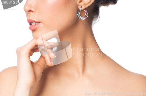 Image of close up of beautiful woman face with earring