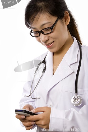 Image of Female Doctor with Mobile Phone