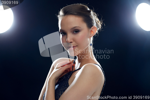 Image of beautiful young asian woman with earring