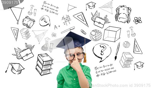 Image of happy boy in bachelor hat and eyeglasses