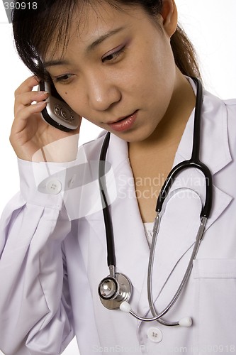 Image of Female Doctor with Mobile Phone