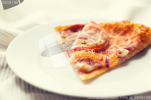 Image of close up of homemade pizza on plate