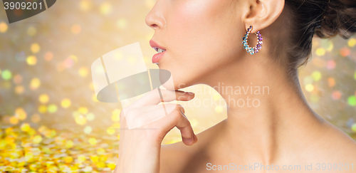 Image of close up of beautiful woman face with earring