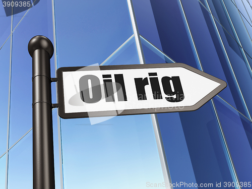 Image of Manufacuring concept: sign Oil Rig on Building background