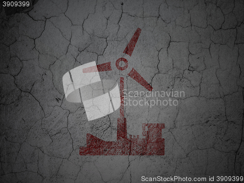 Image of Manufacuring concept: Windmill on grunge wall background