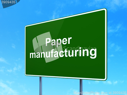 Image of Manufacuring concept: Paper Manufacturing on road sign background