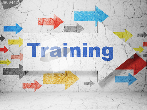 Image of Studying concept: arrow with Training on grunge wall background