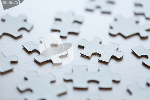 Image of close up of puzzle pieces on table