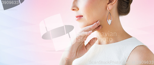 Image of close up of beautiful woman face with earring