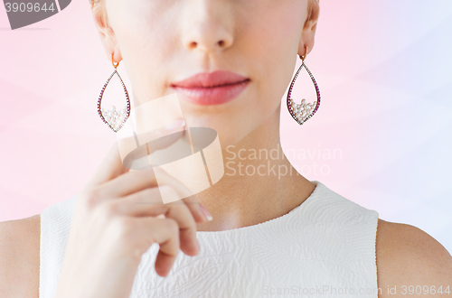 Image of close up of beautiful woman face with earrings