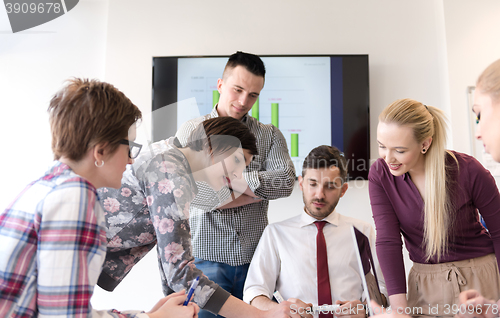 Image of young business people group on meeting at modern office