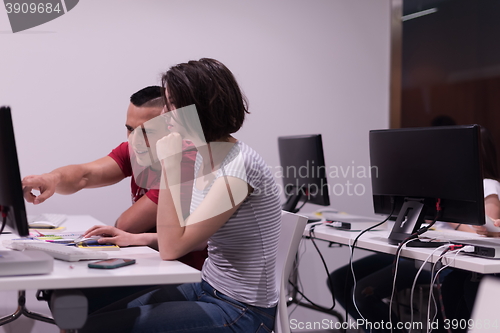 Image of technology students group working  in computer lab school  class