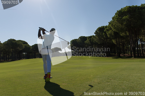 Image of golf player hitting shot