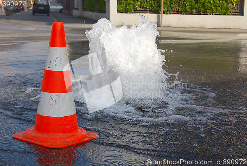Image of hydrant on the street,opened