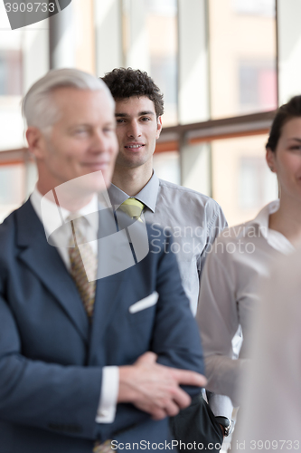 Image of portrait of young business man at modern office