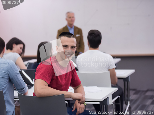 Image of technology students group in computer lab school  classroom