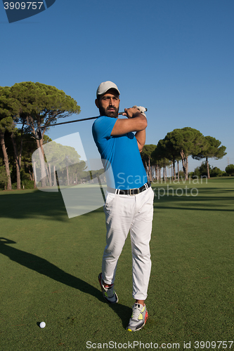Image of golf player hitting shot
