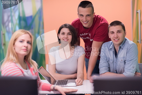 Image of technology students group in computer lab school  classroom