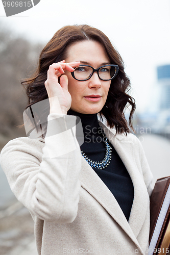 Image of beautiful woman with glasses