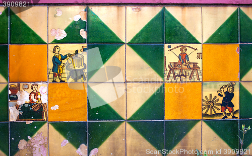 Image of ancient wall with old ceramic tile