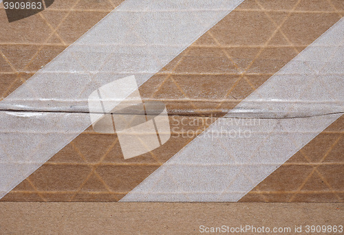 Image of Packet parcel with striped tape