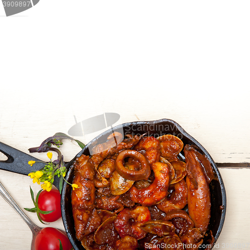 Image of fresh seafoos stew on an iron skillet