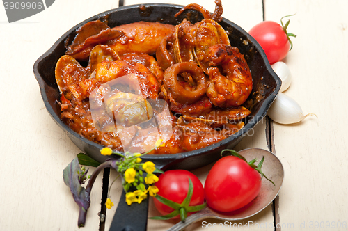 Image of fresh seafoos stew on an iron skillet