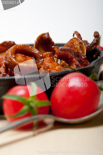 Image of fresh seafoos stew on an iron skillet