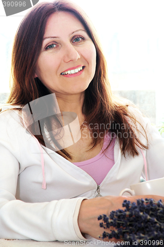 Image of Mature woman relaxing
