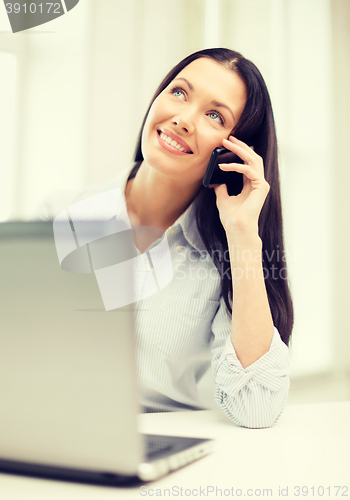 Image of smiling businesswoman or student with smartphone