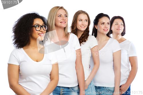 Image of group of happy different women in white t-shirts