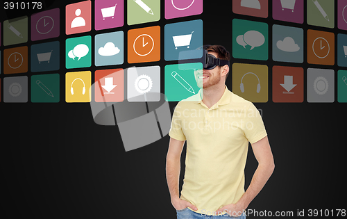 Image of happy man in virtual reality headset or 3d glasses