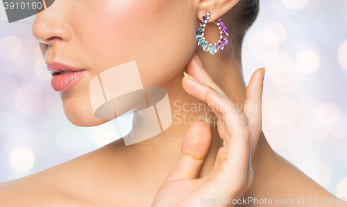 Image of close up of beautiful woman face with earring