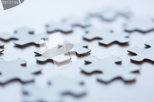 Image of close up of puzzle pieces on table