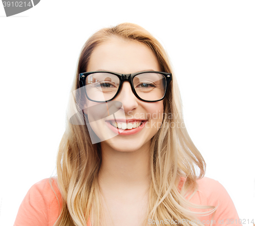 Image of happy young woman or teenage girl in eyeglasses