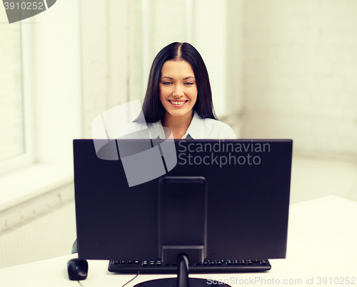 Image of smiling businesswoman or student with computer