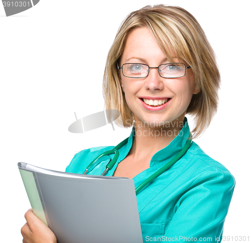 Image of Portrait of a woman wearing doctor uniform