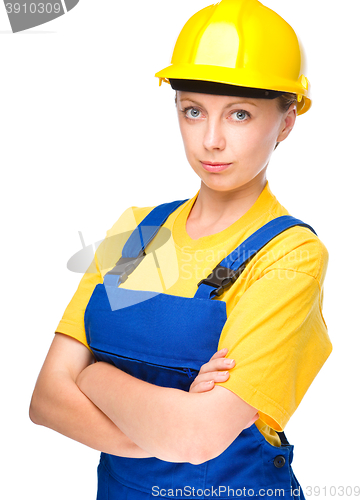 Image of Young lady as a construction worker