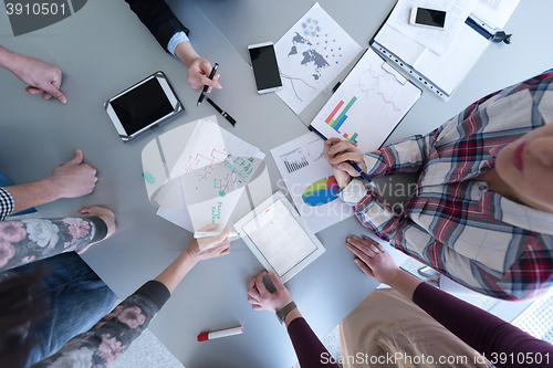 Image of top  view of business people group brainstorming on meeting