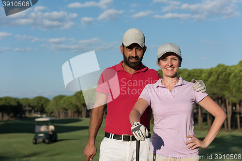 Image of portrait of couple on golf course