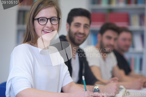 Image of group of students study together in classroom