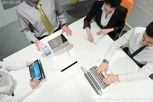 Image of aerial view of business people group brainstorming on meeting