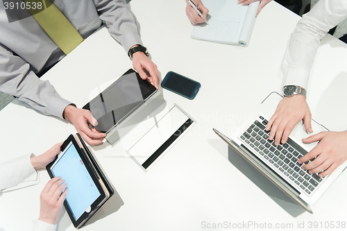 Image of aerial view of business people group brainstorming on meeting