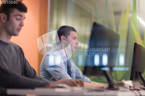 Image of technology students group working  in computer lab school  class
