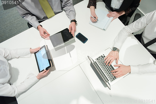 Image of aerial view of business people group brainstorming on meeting