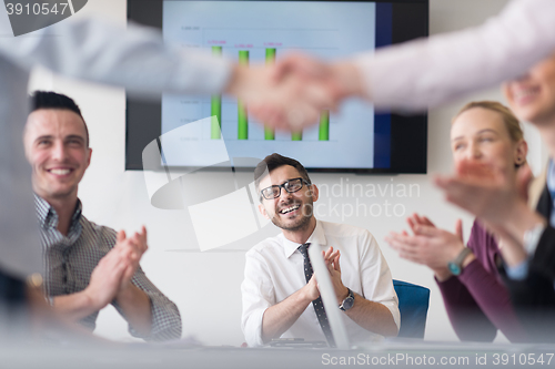 Image of business womans handshake