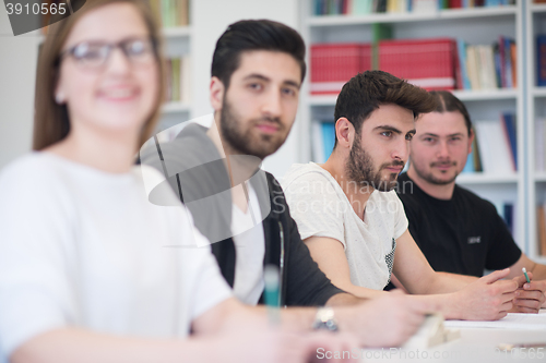 Image of group of students study together in classroom